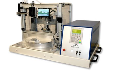 Bügellötsystem mit 450mm Drehteller und zwei Arbeitspositionen.